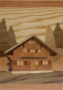 Chalet entre les sapins, marqueterie réalisée sur commande
